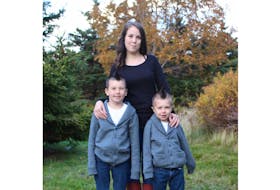 Shylowe Chaulk with her sons, seven-year-old Marshall Paul and four-year-old Damien Paul. Chaulk is looking for the man who helped her when she was recently stranded on the Labrador highway.