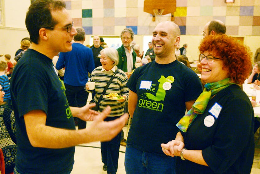P.E.I. Green party fundraising chair Jordan Bober, left, chats with newly-elected Kings County representative Kyle MacDonald and treasurer Sue Whitaker during the party’s AGM in Charlottetown’s Park Royal United Church on Saturday. Members heard during the AGM that the party had a record year for fundraising in 2017. MITCH MACDONALD/THE GUARDIAN