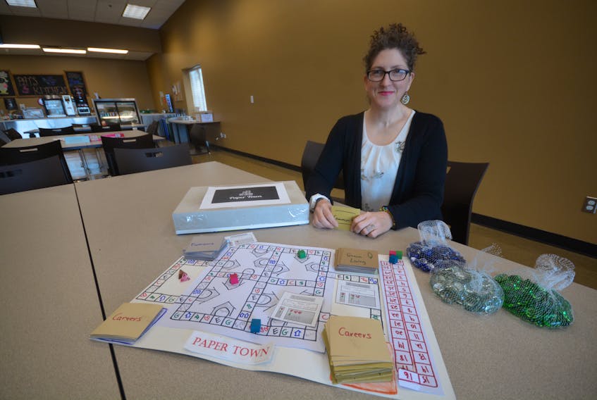NSCC student Debra-Dawn Megeney his turning a business administration assignment into a prospective business opportunity by seeking investors for her board game Paper Town.
