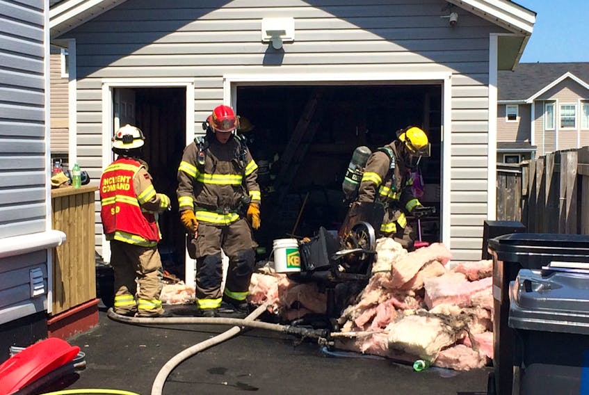 St. John's Regional Fire Department firefighters quickly doused a garage fire Green Acre Drive in the Southlands area of the city Tuesday.