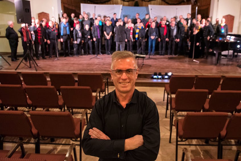 Bryan Crocker, conductor of the Halifax Gay Men’s Chorus, is shown with the group during rehearsal for its Christmas choir performance, Don We Now Our Gay Apparel, held at St. Andrew’s United Church in Halifax during mid-December. JUDY PORTER