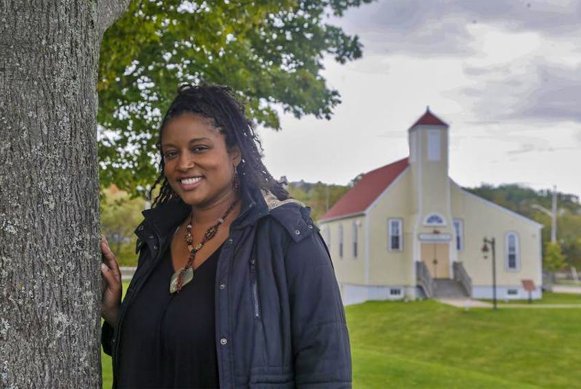 Author Shauntay Grant, whose book Africville is nominated for a Governor General’s Literary Award, stands in front of the Africville Museum.