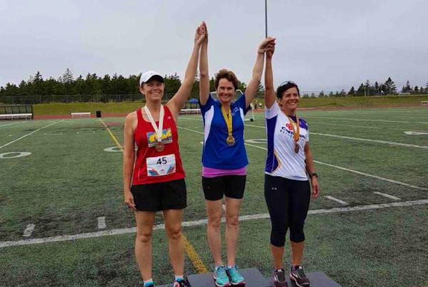 The Town of Lunenburg’s Mayor Rachel Bailey (middle) is shown with her gold medal at the 2018 Canada 55+ Games which were held in Saint John, New Brunswick, Aug. 21 to 24.