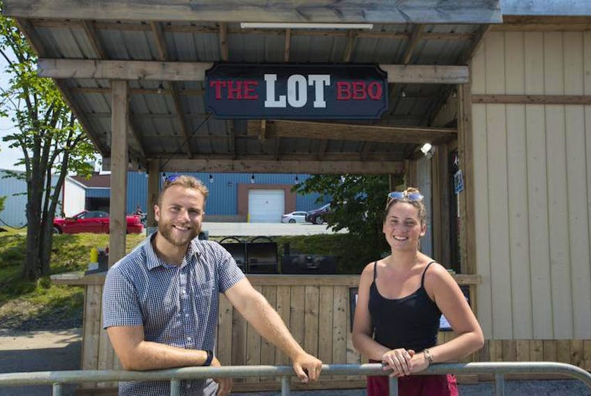 Jacob Read, left, and Joey Chapman have opened the Lot BBQ, which is set up in the Halifax Civic Centre parking lot off Young Street. Their business is one of retail columnist Arthur Gaudreau’s highlights this week.