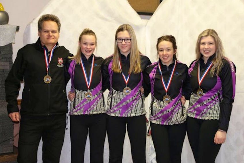 Mackenzie Glynn (right) and her St. John's rink have successfully defended their Newfoundland and Labrador junior women's curling championship, after compiling a 4-0 record at the 2018 provincials, held this week at the Re/Max Centre. Other members of the team include (from left), coach Dave Trickett, Camille Burt, Sarah Chaytor and Katie Follett.