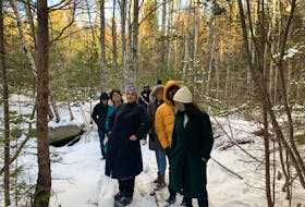 Members of Change is Brewing Collective, Vanessa Hartley of SEED, and Lauryn Guest gathered at the property in Jan 2021.