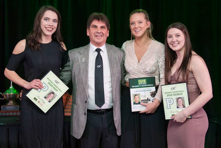 UPEI Panthers women's basketball head coach Greg Gould with three of his players following the university's recent athletics banquet. From left are Kiera Rigby, Gould, Jane McLaughlin and Reese Baxendale.