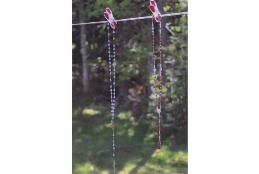 On May 19, 2012, Andrea Jerrett married her best friend John in Pictou, N.S. Her mom hung Andrea’s great-grandmother’s rosaries on the clothesline the night before the wedding. The weather was perfect.