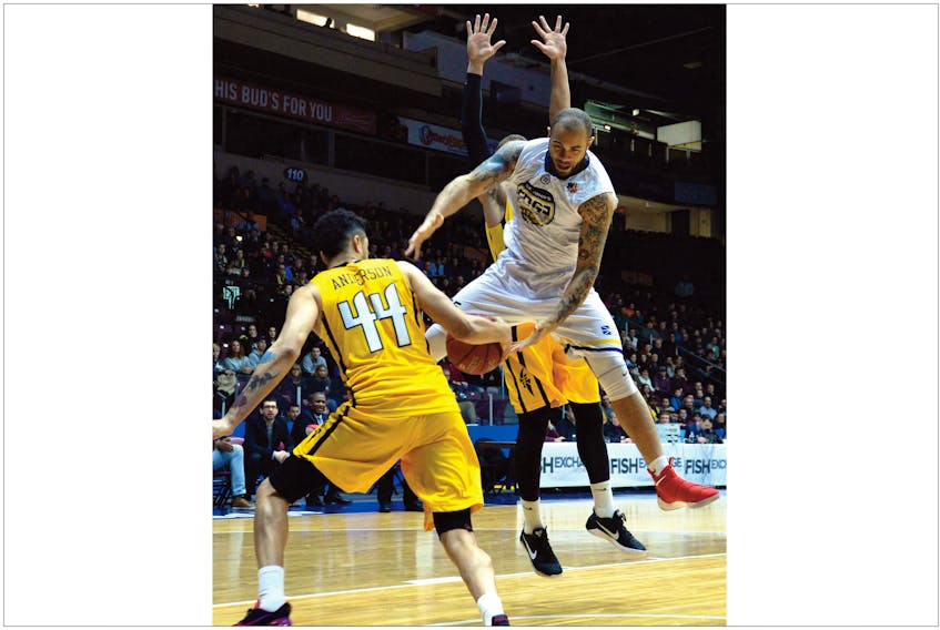 Grandy Glaze (55) of the St. John’s Edge looks to wrest the ball from Ryan Anderson of the London Lightning as he descend to the floor during their NBL Canada game at Mile One Centre Wednesday night. The Edge won 136-117 to improve to 7-2 in their first season in the league.