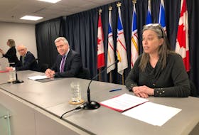 Premier Dwight Ball (centre) is flanked by health minister John Haggie (left) and chief medical officer Dr. Janice Fitzgerald during the province's COVID-19 Wednesday, March 24, COVID-19 update.