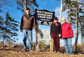 Dave Hull, Jill Mattinson and Nan Armour stand by the sign for the Mattinson Hansford Cemetery on the Hansford Road near Oxford. The Mattinson Hansford Family Cemetery Society has been working over the last few years to restore the cemetery that operated from 1862 to 1921.