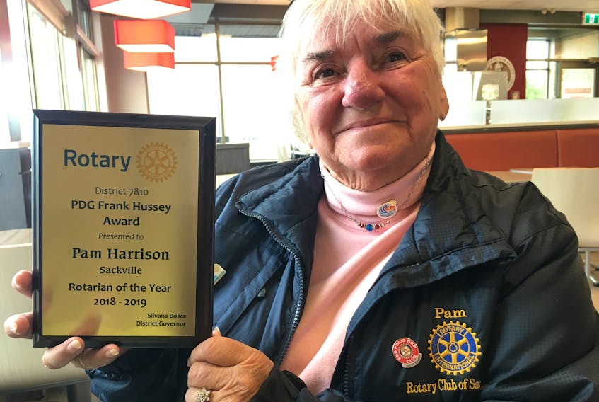 Pam Harrison shows the District 7810 Rotarian of the Year Award she was presented at the district conference in Fredericton during the Sept. 27-28 weekend. Harrison, a native of River Hebert, N.S. and a member of the Sackville, N.B. Rotary Club, has been a Rotarian for 30 years.