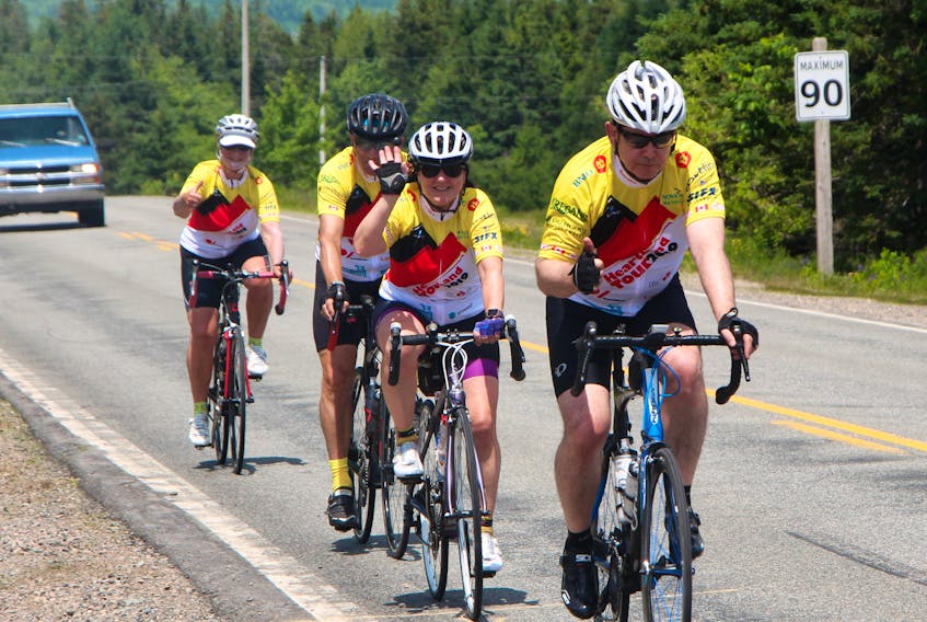 Heartland Tour cyclists making their way back to Antigonish on Hwy. 245 after going around the Cape George loop, July 9.