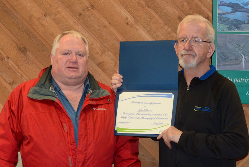 Ronnie Maine, left, and John Parsons attended the Nov. 28 meeting of County Council, where Parson’s received a certificate recognizing his ‘outstanding contribution to the safety culture of the Municipality of Cumberland.’
