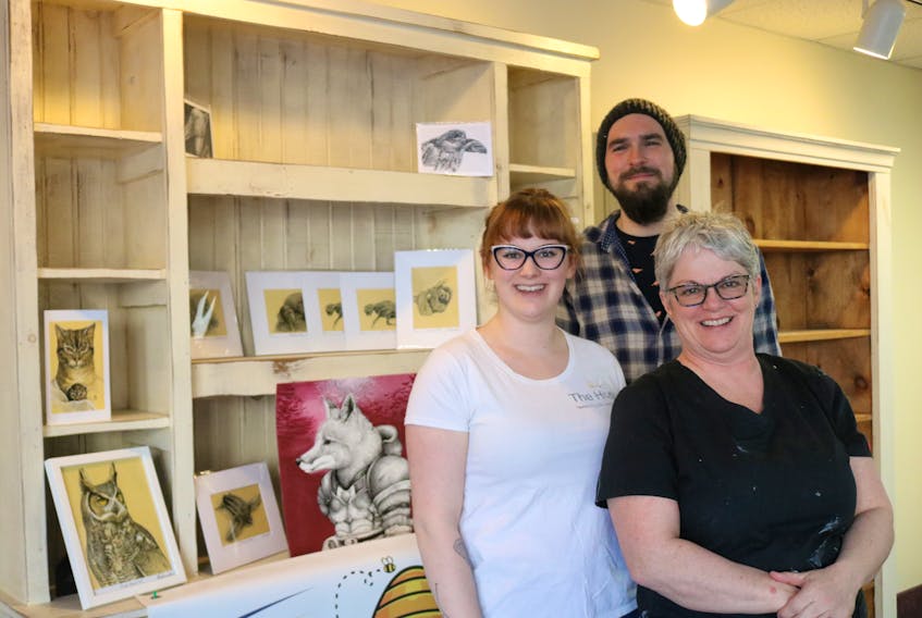Hannah Barton, left, Hugo Rousseaux-Bridle, and Kim Barton are excited to open the doors of the new location of The Hive Nurturing the Creative Self, now located at 216 Water Street.