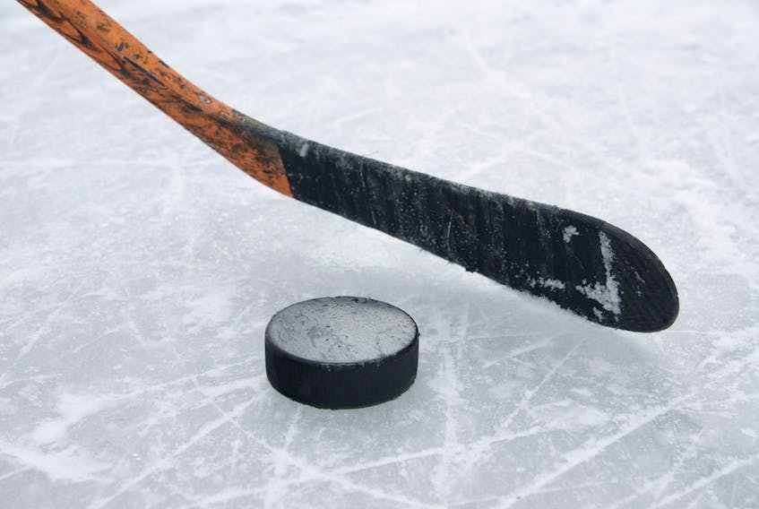 Hockey stick and puck.