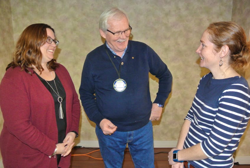 Cumberland YMCA CEO Trina Clarke and Amherst Rotarian Paul Calder talk to YMCA community support co-ordinator Alison Lair after the club’s meeting on Monday.
