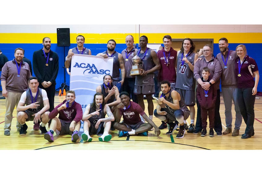 The Holland College Hurricanes won the Atlantic Collegiate Athletic Association men's basketball championship Sunday in Moncton. Team members, front row, from left, are Isaac Cheverie, Marc Hofer, Connor Therrien, Martin Campbell, Eleazer Goodman and Jordan Holness. Second row, assistant coach Trent Whitty, assistant coach Chase Bowden, Jace Colley, Travis Adams, assistant coach Dale McIsaac, Roosevelt Whyley, Josh Bourque, Cameron Paynter, head coach Josh Whitty with Noah Whitty, assistant coach Ryan Laughlin and physiotherapist Jenny Dickson. Mike Bernard Photography