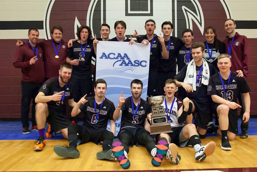 The Holland College Hurricanes men's volleyball team won the Atlantic Collegiate Athletic Association banner on home court Sunday in Charlottetown. Team member, front row, from left, are John Ronalds, Nick Menzies, Brett Butler, Marcus Lapointe, Aaron Pugh and Ethan Nadeau. Second row, Matthew Kelly, Nathan Archibald, Simon Archibald, Riley O’Keefe, Keith Johnston, Jeff MacDonald, Kamden Arsenault, Zach Thibodeau, Alice Champion and Max Arsenault. Mike Bernard Photography