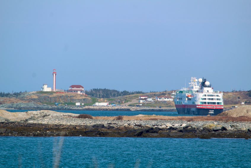 The cruise ship Fram, operated by the Norway-based Hurtigruten Group, anchored just east of the Cape Forchu lighthouse on May 2.