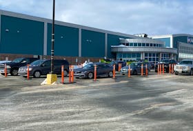 Cars line up outside the drive-thru COVID-19 testing facility outside the Reid Community Centre in Mount Pearl. With the backlog of tests addressed, Eastern Health has closed the Mount Pearl Senior High test facility for the time being.