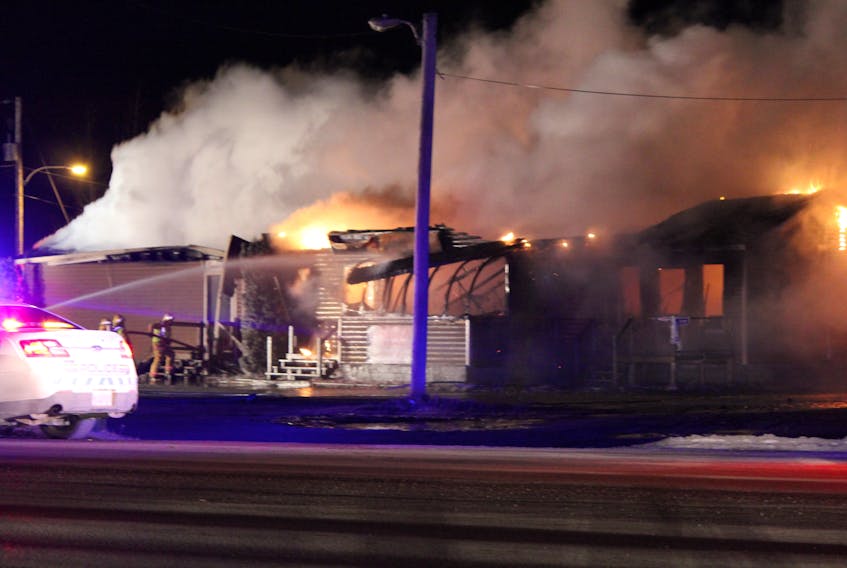 Flames engulfed Badger Diner late Sunday evening.