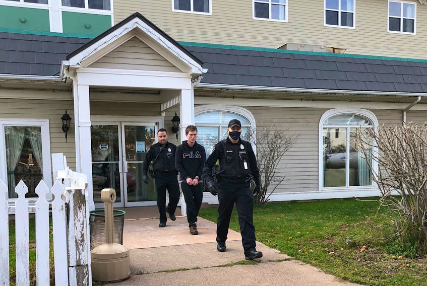 Nathan Paul Gaudet leaves Summerside Supreme Court accompanied by sheriffs. Gaudet was found guilty of arson in a 2018 fire, he was sentenced to six months in jail.