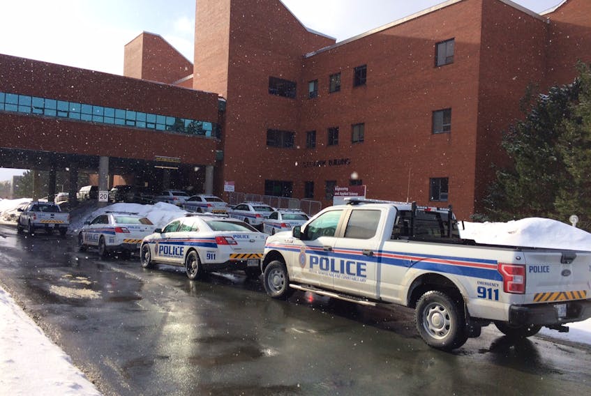 The Royal Newfoundland Constabulary has evacuated the Memorial University engineering after unconfirmed reports of a man with a firearm in the building.
