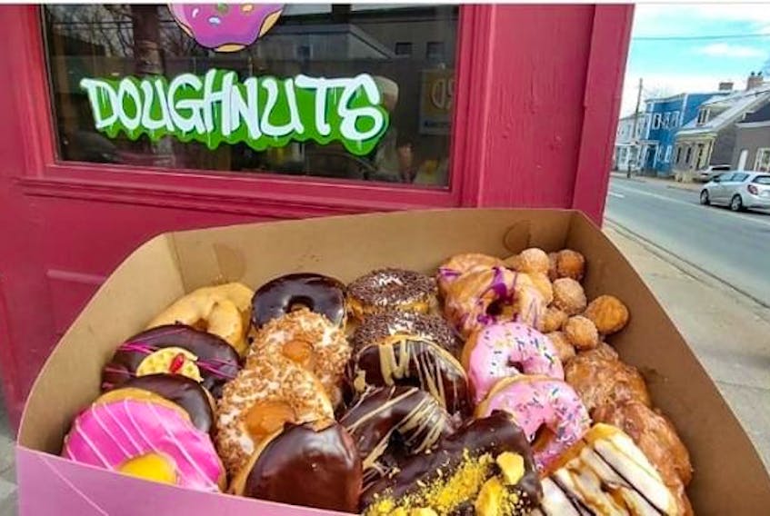 A box of goodies from Vandal Doughnuts is displayed outside the bakery on Gottingen Street.