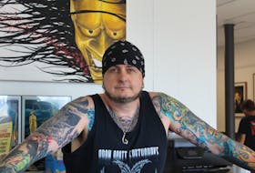 Aron Scott at his business Ink City Tattoos in Summerside.