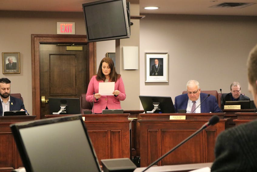 Summerside City Councillor Carrie Adams presents the bylaw and policy review committee report to councillors at a regular monthly council meeting in January