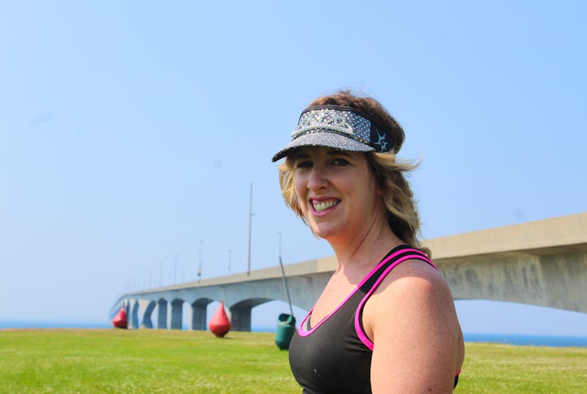 Runner Shanice MacDonald poses for a photo at the Confederation Bridge