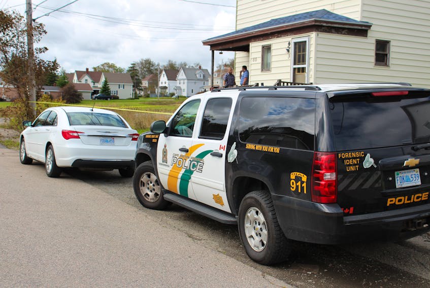 Cape Breton Regional Police are shown on scene at a Lower MacLean Street residence on Monday, Sept. 16, 2019. Detectives on scene confirmed they are investigating an incident that happened last night around midnight but could not comment any further. The Forensic Identification unit are on scene with the investigators, taking photos and collecting evidence from the residence which is one apartment in a three-unit building.