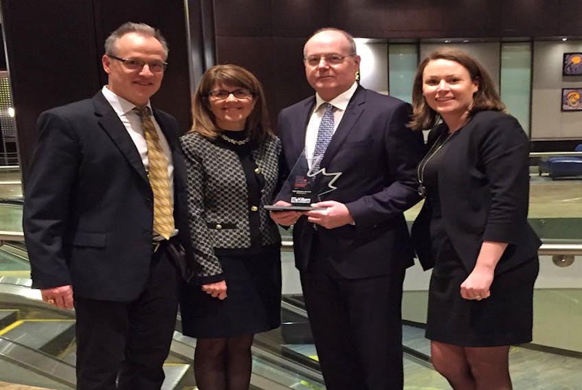 From left: Jeremy Jackson, vice president, marketing, Pamela Crowell, vice president, tenant experience and MHC management, Philip Fraser, president and CEO and Colleen McCarville, vice president, human resources accept the award for Canada’s Most Admired Corporate Cultures.