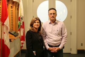 Borden-Kinkora MLA Jamie Fox and former Conservative Party Leader Rona Ambrose pose for a photo outside the P.E.I. legislative chamber on Thursday night. A bill requiring sexual assault training for incoming judges was introduced by Fox and supported by Ambrose. It received unanimous support from MLAs.