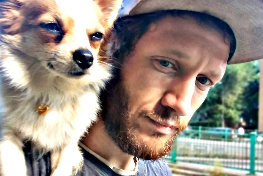 Christian Unrau, 30, shown with his dog Max. He had been tenting in Point Pleasant Park before going missing on Dec. 27.