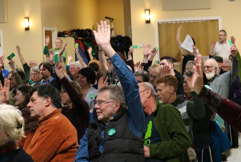 Members vote on a constitutional amendment at the annual general meeting of the P.E.I. Green Party on Saturday. The party has become the most popular political force on the Island, according to recent polling.