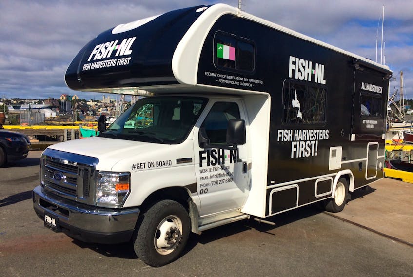 The executive of the Federation of Independent Sea Harvesters of Newfoundland and Labrador (FISH-NL) gathered at the Prosser's Rock Small Boat Basin at Fort Amherst this morning to announce their province-wide membership drive in this Ford E-450 Super Duty RV.
