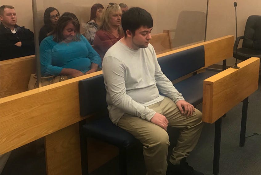 Brandon Quilty, 23, sits in a St. John’s courtroom Wednesday morning, prior to learning his charge of dangerous driving would not be going to trial due to a lack of evidence.