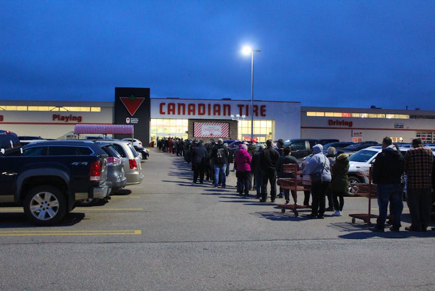 A long line formed early Thursday morning outside of the Canadian Tire outlet in Sydney. The store's Red Thursday sale, in advance of Black Friday, proved popular.