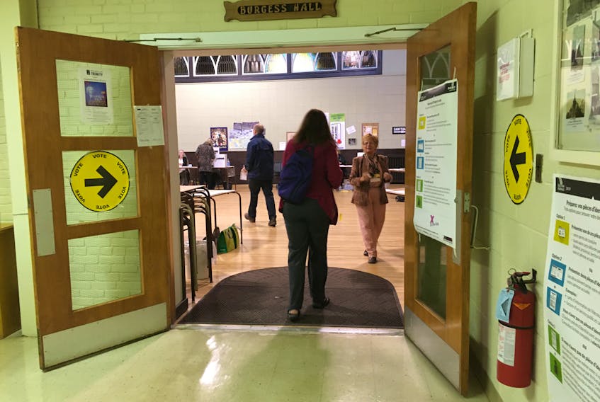 Activity was steady at the polling station at Heartz Hall at Trinity-St. Stephen's United Church in Amherst on Monday. Voting continues until 8:30 p.m.