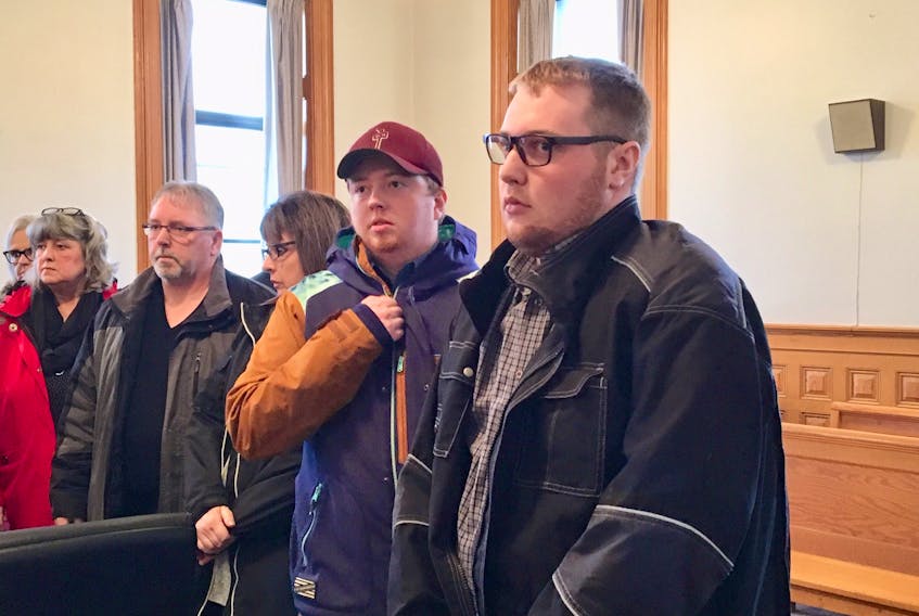 Joshua Steele-Young (right) was in Newfoundland Supreme Court in St. John’s Monday for the start of his trial, which is expected to last two weeks.