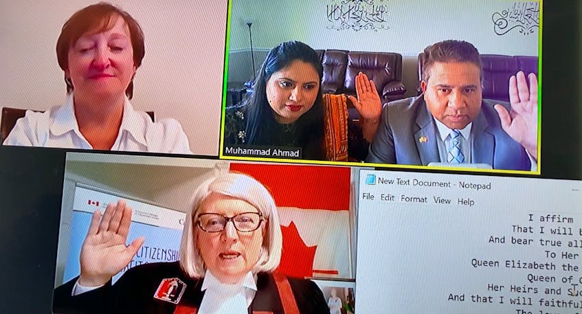 Shumaila Jamil and Muhammad Ahmad, pictured top right, took an oath of citizenship during a virtual citizenship ceremony on Zoom on Monday.