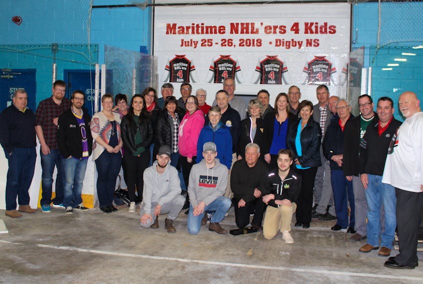 Local volunteers and the host committee met with organizers of Maritime NHL'ers for Kids recently to discuss final planning details of the celebrity golf tournament on July 25 and 26