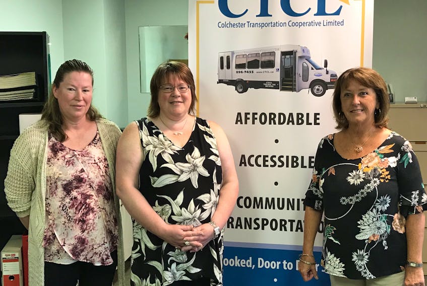 From left – Helen Sims from the Cumberland County Transportation Society, Susan Taylor, manager of the Colchester Transportation Cooperative Ltd., and provincial Finance Minister Karen Casey. Both the CTCL and CCTS are receiving hundreds of thousands to buy new vehicles.