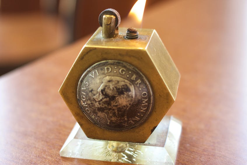 Frank Melanson believes the lighter he bought is a piece of 1945 Naval trench art.