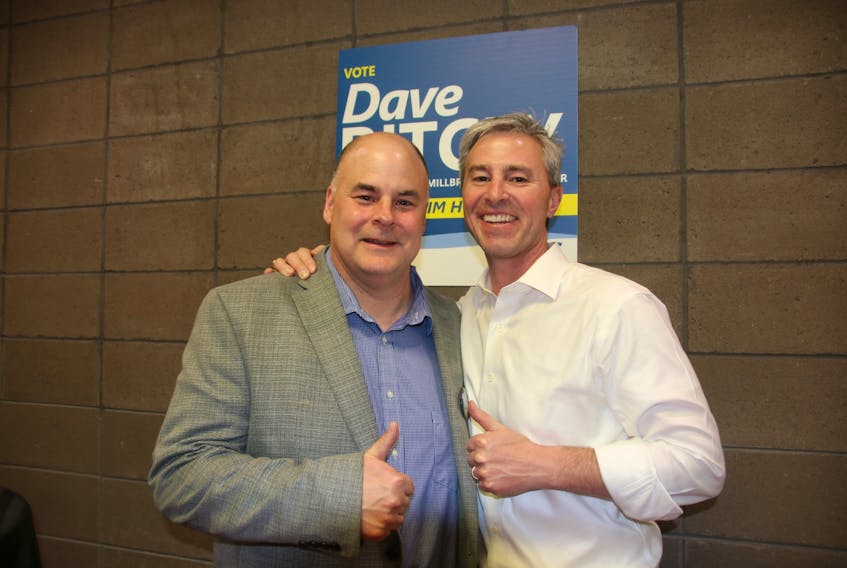 Dave Ritcey, the MLA elect for Truro-Bible Hill- Millbrook-Salmon River, left, and Tim Houston, provincial Conservative leader, celebrated as the election results came in Tuesday evening.