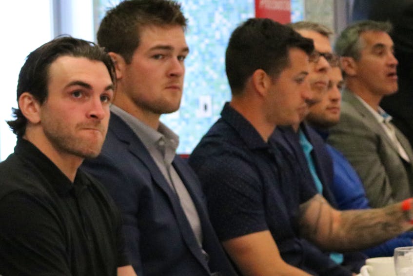 Alex Gallant, left, and Ross Johnston, second left,a member of the New York Islanders’ organization who is from Suffolk, P.E.I., were among the head-table guests at the Special Olympics Festival luncheon in Summerside recently. Gallant signed a contract with the Vegas Golden Knights on Sunday.