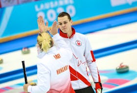 Newfoundlander Nathan Young got to celebrate a championship with partner Laura Nagy of Hungary after winning the final of the 2020 World Youth Olympic Games today in Switzerland. — World Curling Ffederation photo