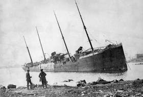 SS Imo aground on the Dartmouth side of the harbour after the explosion. - Nova Scotia Archives